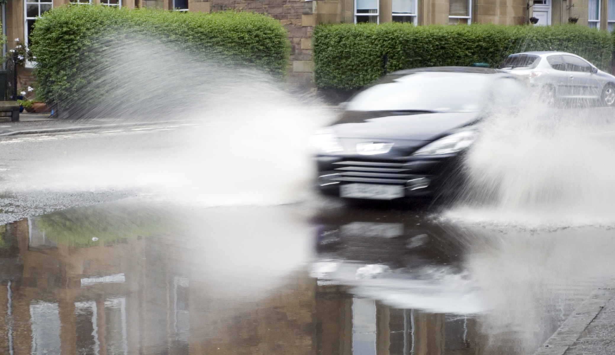 How Can I Drive Safely on Flooded Roads?