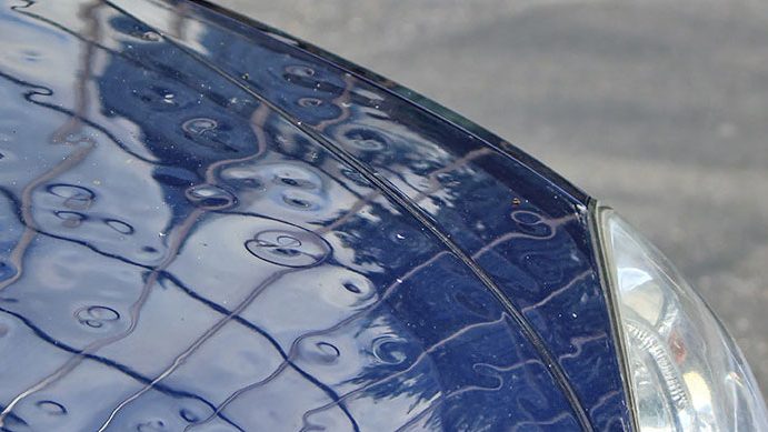 How Do Auto Body & Glass Repair Shops Fix Hail Damage?