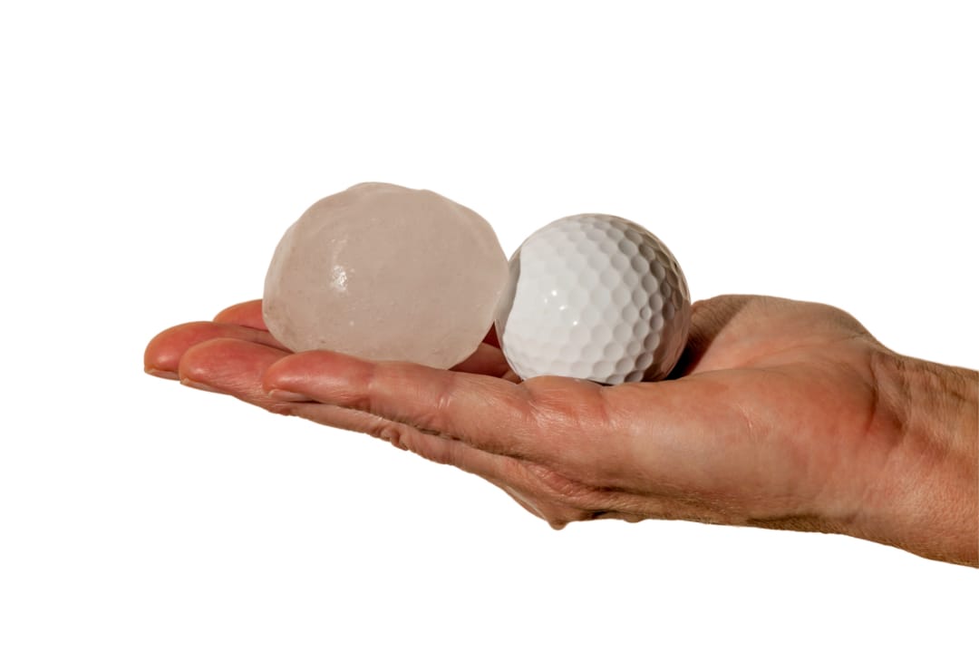 Hail stones that could cause dents on a car body