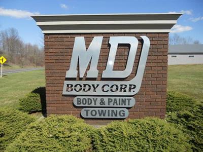 Md Body Corporation 5642 Edison St NE, Hartville, OH 44632 Md Body Corporation Logo