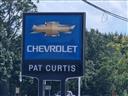 Pat Curtis Chevrolet Logo