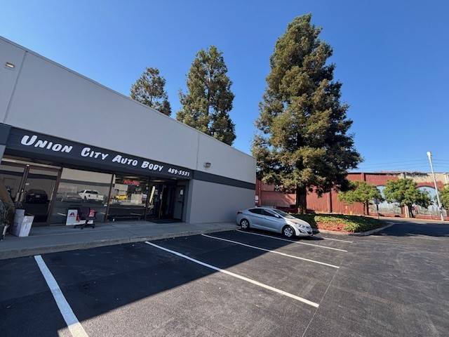 Union City Autobody 1250 Pacific St, Union City, CA 94587 Union City Autobody Logo